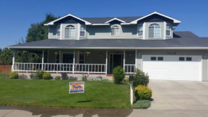 Grey house with large front porch