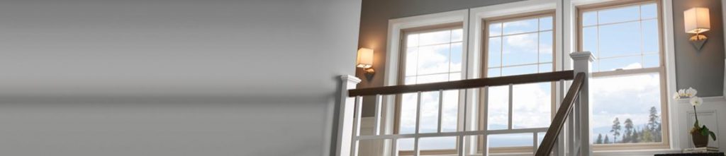 Three newly installed windows against staircase
