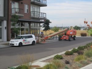 Vivax Pros vehicle parked in front of apartment complex