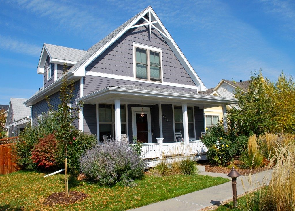 Beautiful grey house with white accents and front porch