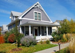 Beautiful grey house with white accents and front porch