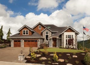 Stone and Wood front house with beautiful landscaping