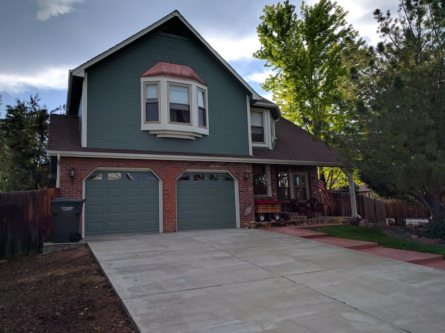 Dark Green House With Red Brick Garage Vivax Pros