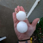 Baseball size hail in hand
