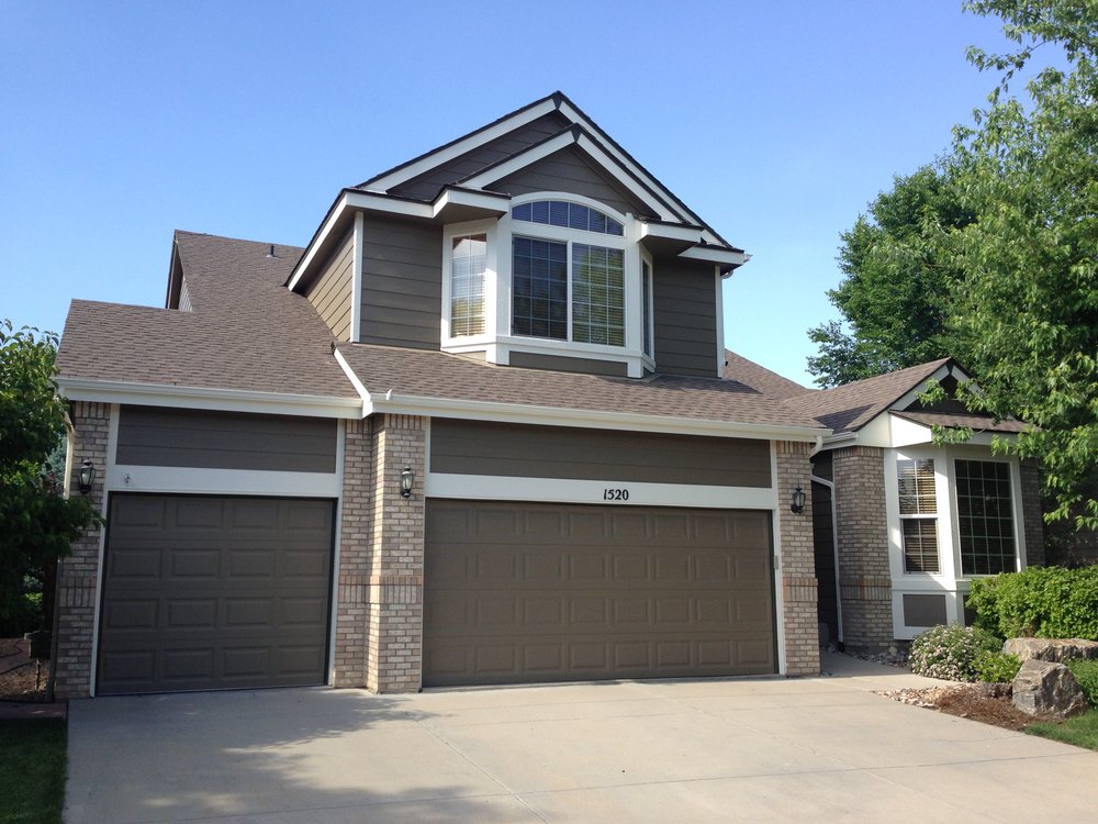 Stone and dark brown house