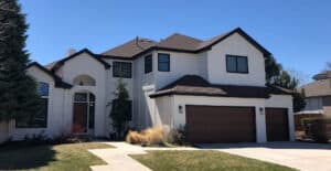 white house with brown garage and door recently painted Vivax Pros