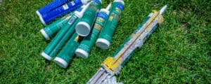 caulking and dispenser lying in grass Vivax Pros