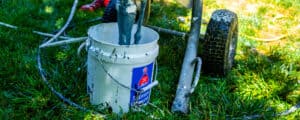 close up of bucket of paint and mixer Vivax Pros